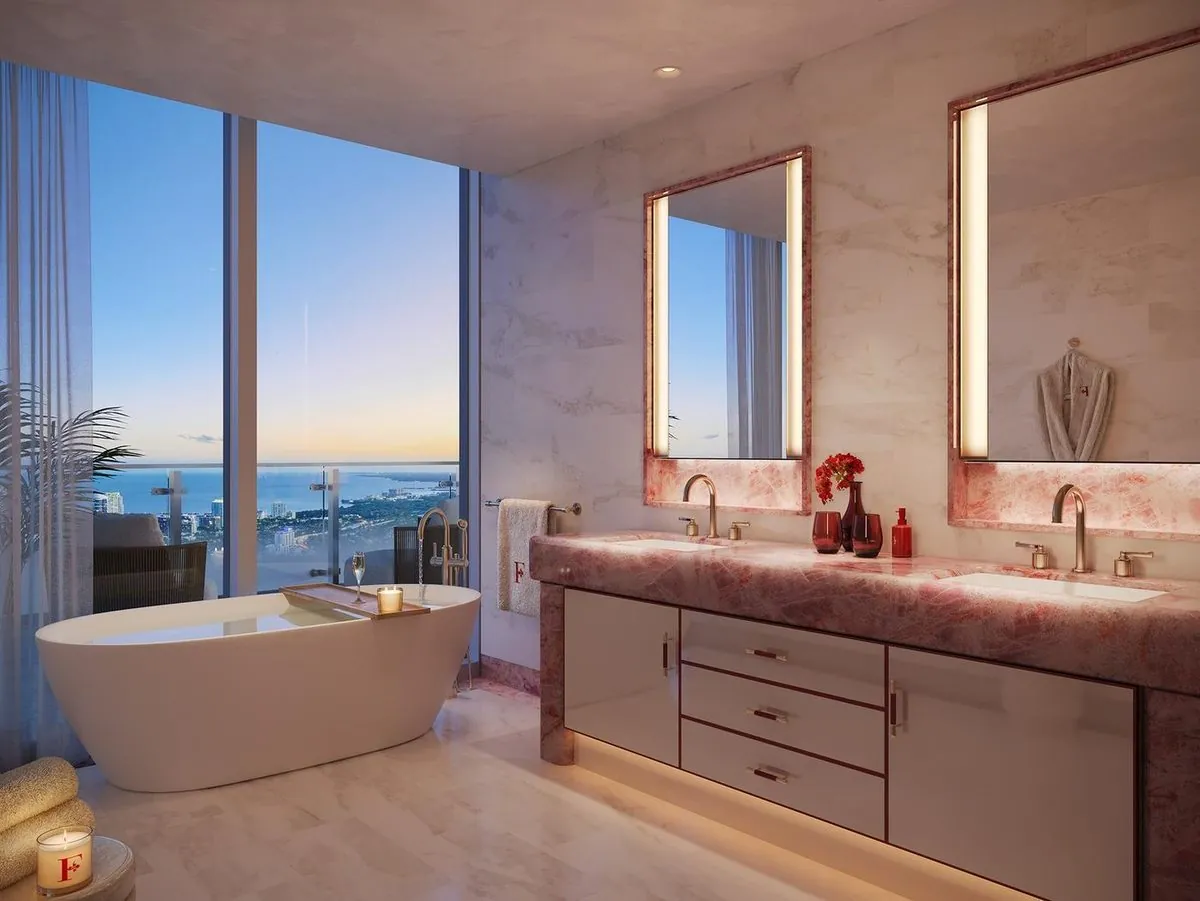 Faena Residences Miami — primary bathroom with rose quartz and bay views